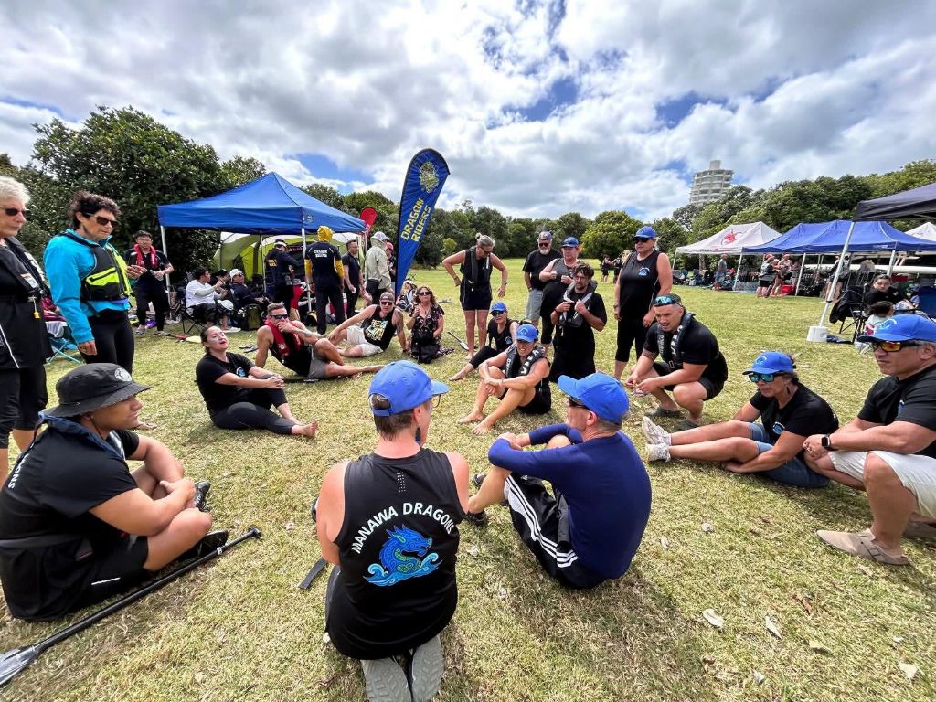 Team at regatta resting