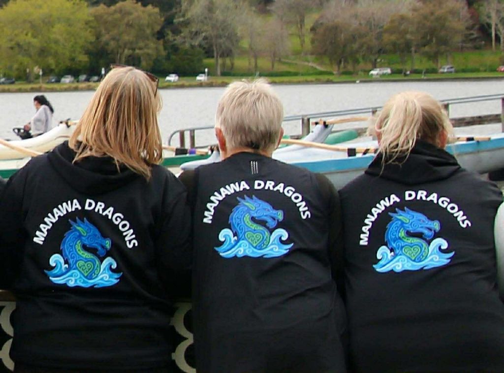 Paddlers in Manawa Dragons hoodies